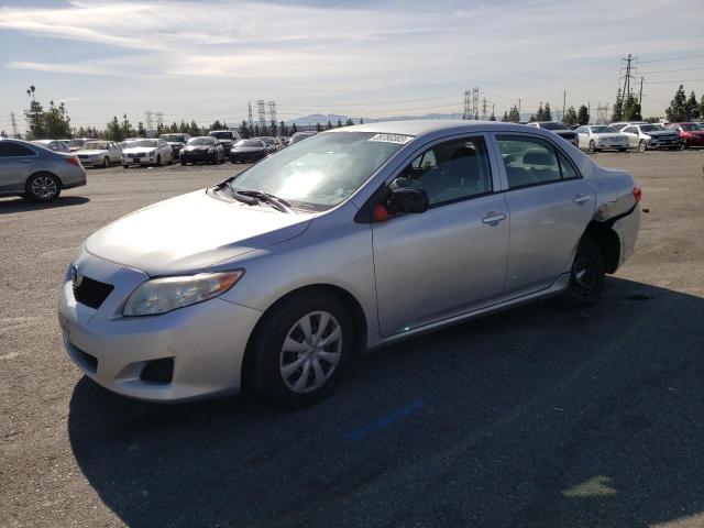 JTDBL40EX99087322 - 2009 TOYOTA COROLLA BASE SILVER photo 1