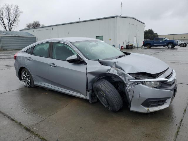 2HGFC2F53JH518795 - 2018 HONDA CIVIC LX SILVER photo 4