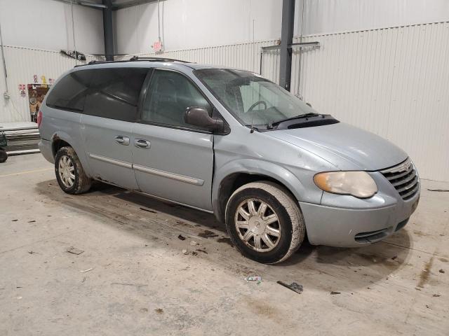 2C4GP54L15R574762 - 2005 CHRYSLER TOWN & COU TOURING SILVER photo 4