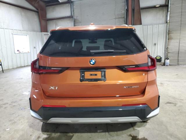 WBX73EF07P5X43409 - 2023 BMW X1 XDRIVE28I ORANGE photo 6