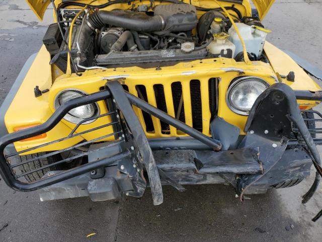 1J4FA29PXYP739490 - 2000 JEEP WRANGLER SE YELLOW photo 11