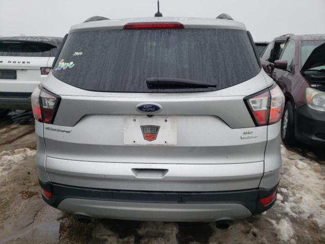 1FMCU0GDXJUC03641 - 2018 FORD ESCAPE SE SILVER photo 6