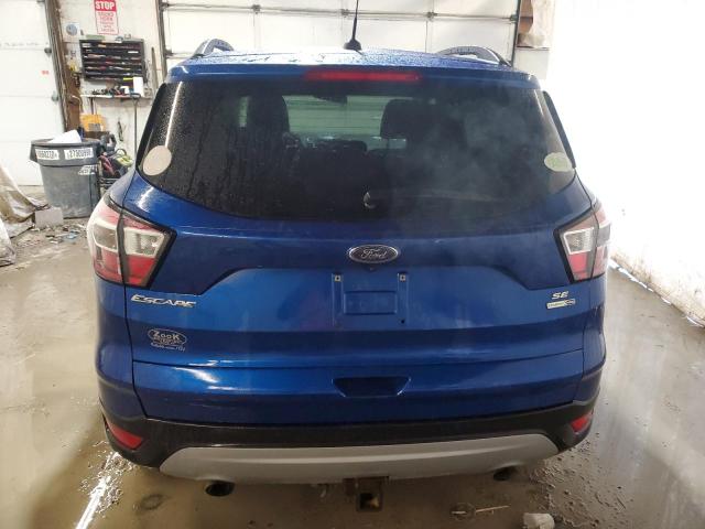 1FMCU9G93HUE13976 - 2017 FORD ESCAPE SE BLUE photo 6