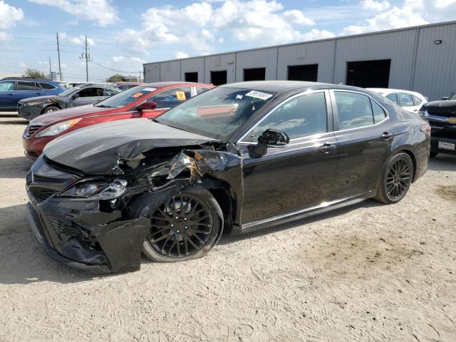 4T1G11AKXPU763336 - 2023 TOYOTA CAMRY SE NIGHT SHADE BLACK photo 1