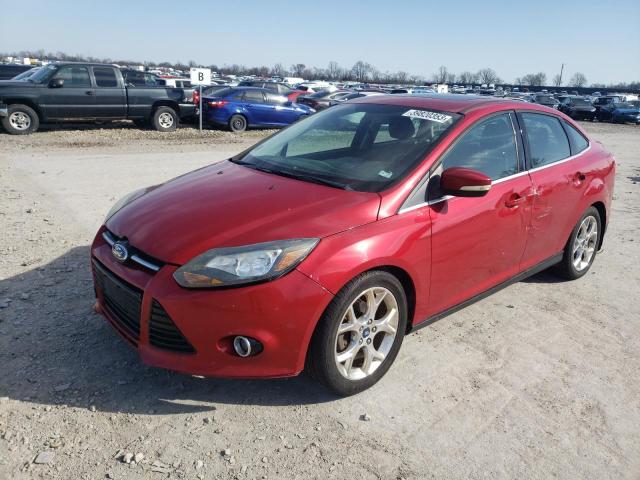 1FAHP3J24CL319829 - 2012 FORD FOCUS TITANIUM RED photo 1