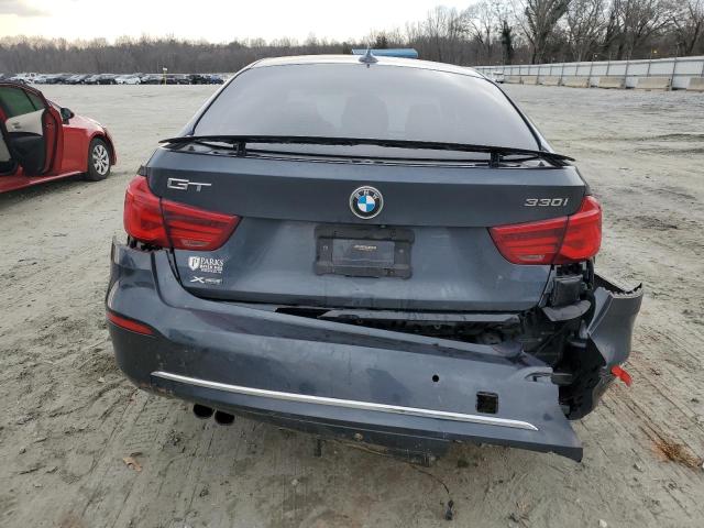 WBA8Z9C56JG827995 - 2018 BMW 330 XIGT GRAY photo 6