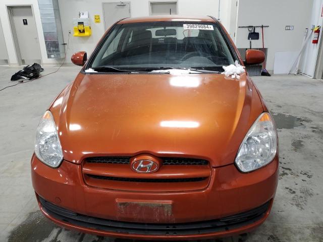 KMHCN3BC7AU166416 - 2010 HYUNDAI ACCENT SE ORANGE photo 5