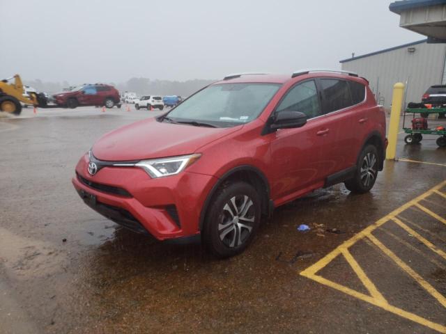 2T3ZFREV4GW283734 - 2016 TOYOTA RAV4 LE RED photo 1