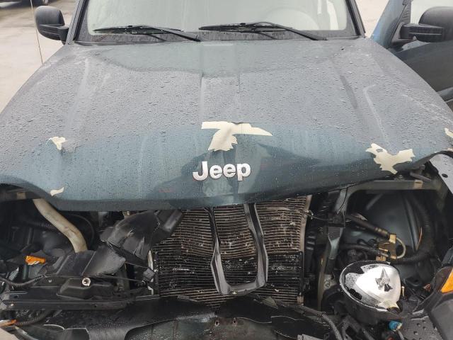 1J4GL48K75W638263 - 2005 JEEP LIBERTY SPORT GREEN photo 11