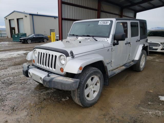 1C4BJWEG1CL216084 - 2012 JEEP WRANGLER U SAHARA SILVER photo 1
