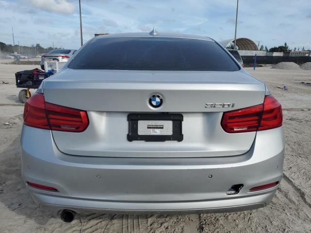 WBA8E1G53JNU92181 - 2018 BMW 320 I SILVER photo 6