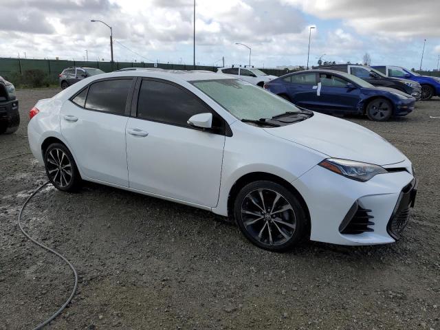 5YFBURHE3HP606394 - 2017 TOYOTA COROLLA L WHITE photo 4