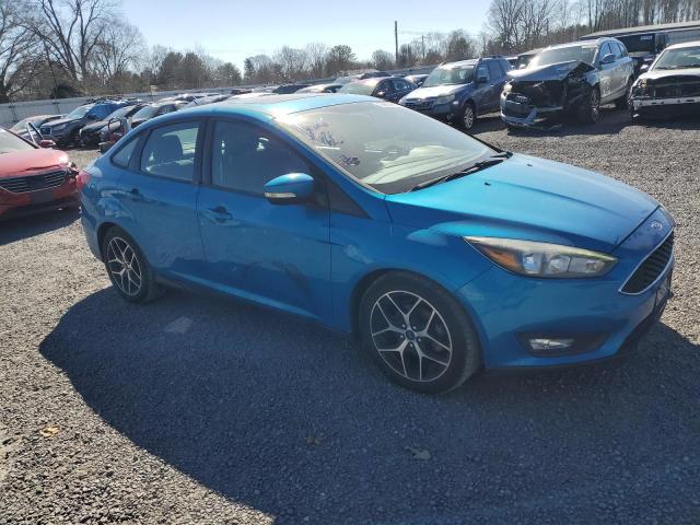 1FADP3H27HL220742 - 2017 FORD FOCUS SEL BLUE photo 4