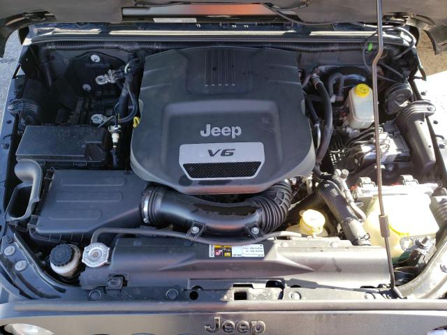 1C4BJWEG7EL254857 - 2014 JEEP WRANGLER U SAHARA BLACK photo 12