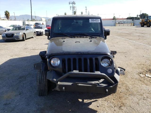 1C4BJWEG7EL254857 - 2014 JEEP WRANGLER U SAHARA BLACK photo 5