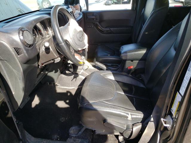 1C4BJWEG7EL254857 - 2014 JEEP WRANGLER U SAHARA BLACK photo 7