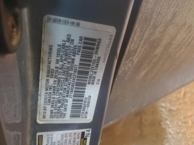 2T1KR38E24C218677 - 2004 TOYOTA COROLLA MA XR SILVER photo 12