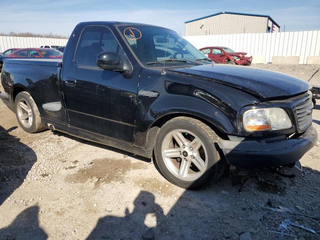 2FTRF073X4CA54684 - 2004 FORD F150 SVT LIGHTNING BLACK photo 4