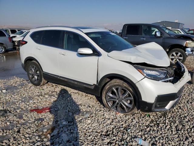 2HKRW2H94NH610594 - 2022 HONDA CR-V TOURING WHITE photo 4