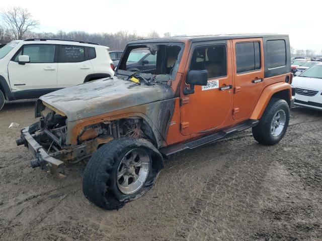 1J4BA5H16AL180661 - 2010 JEEP WRANGLER SAHARA ORANGE photo 1