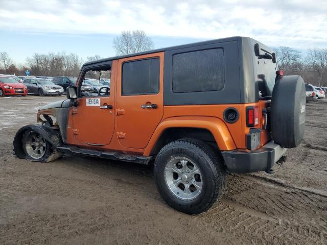 1J4BA5H16AL180661 - 2010 JEEP WRANGLER SAHARA ORANGE photo 2