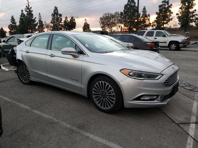 3FA6P0LU6HR149423 - 2017 FORD FUSION SE HYBRID SILVER photo 4