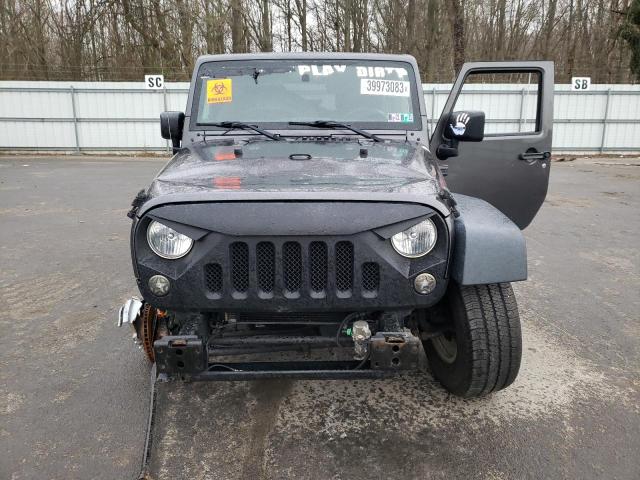 1C4HJWDG8GL338829 - 2016 JEEP WRANGLER U SPORT ნაცრისფერი ფოტო 5