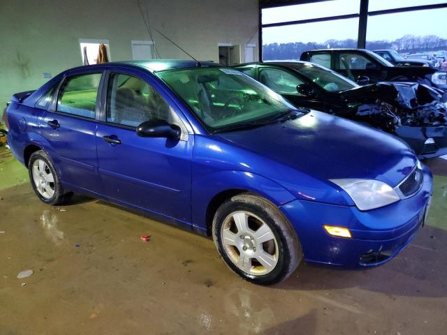 1FAHP34N06W142351 - 2006 FORD FOCUS ZX4 BLUE photo 4