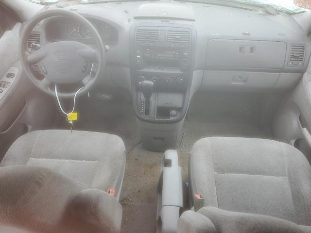 KNDUP131046512559 - 2004 KIA SEDONA EX SILVER photo 8