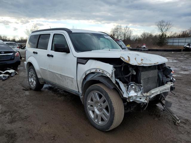 1D4PU4GK1BW590911 - 2011 DODGE NITRO HEAT WHITE photo 4