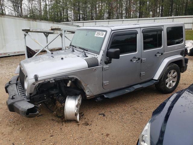 1C4BJWEG7FL749660 - 2015 JEEP WRANGLER U SAHARA SILVER photo 1