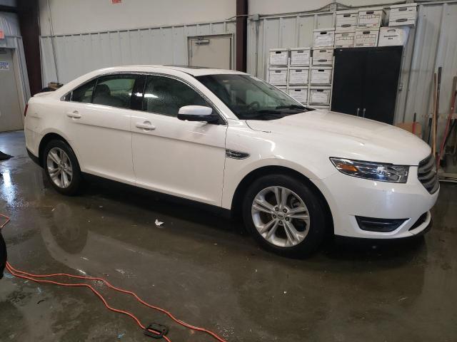 1FAHP2E86GG135791 - 2016 FORD TAURUS SEL WHITE photo 4