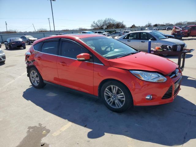 1FAHP3M27CL339567 - 2012 FORD FOCUS SEL RED photo 4