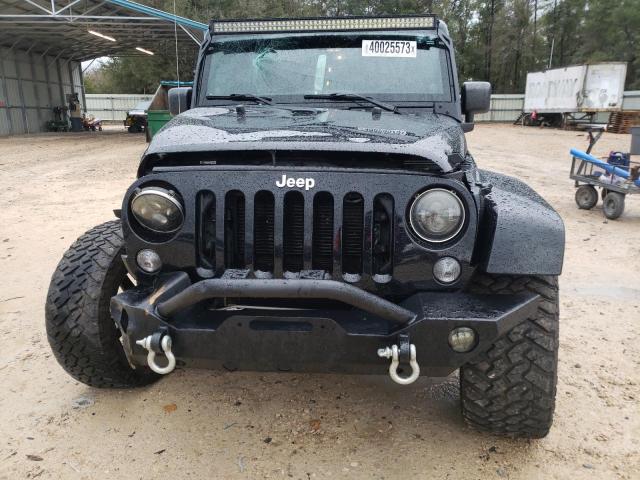 1C4BJWEG8EL109309 - 2014 JEEP WRANGLER U SAHARA BLACK photo 5