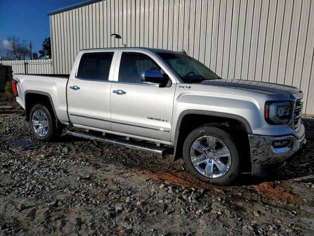 3GTU2NEC7HG244148 - 2017 GMC SIERRA K1500 SLT SILVER photo 4