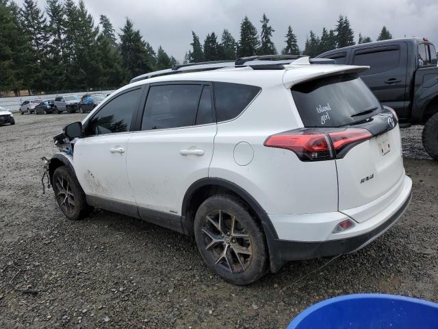 JTMJJREV8JD250610 - 2018 TOYOTA RAV4 HV SE WHITE photo 2