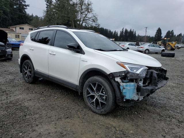 JTMJJREV8JD250610 - 2018 TOYOTA RAV4 HV SE WHITE photo 4