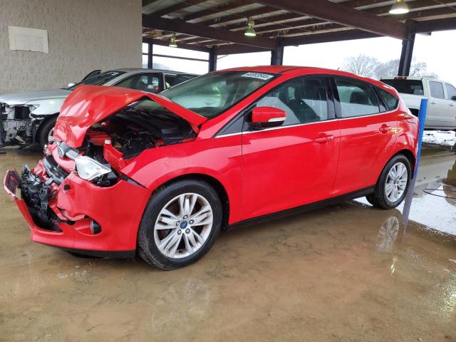 1FAHP3M29CL357763 - 2012 FORD FOCUS SEL RED photo 1