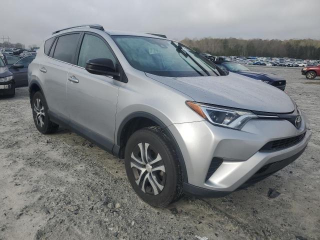 2T3ZFREV0HW347981 - 2017 TOYOTA RAV4 LE SILVER photo 4