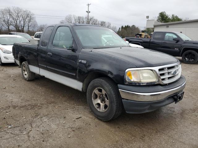 1FTZX1724YNA02526 - 2000 FORD F150 BLACK photo 4