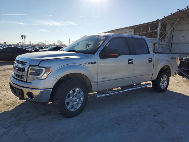 1FTFW1ET8EFB84237 - 2014 FORD F150 SUPERCREW SILVER photo 1