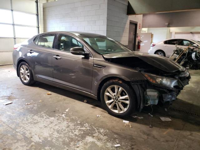 KNAGN4A75B5164754 - 2011 KIA OPTIMA EX BLACK photo 4