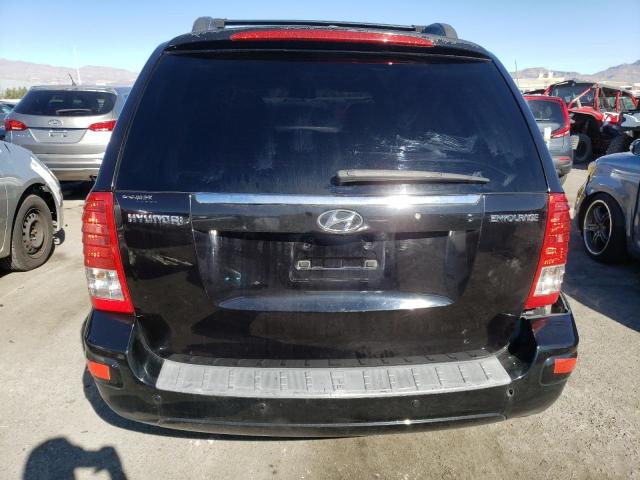 KNDMC233586052291 - 2008 HYUNDAI ENTOURAGE GLS BLACK photo 6