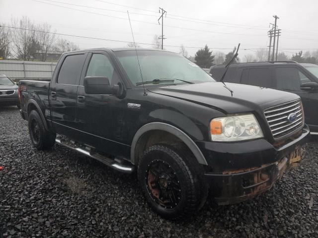 1FTPW145X5FB03598 - 2005 FORD F150 SUPERCREW BLACK photo 4