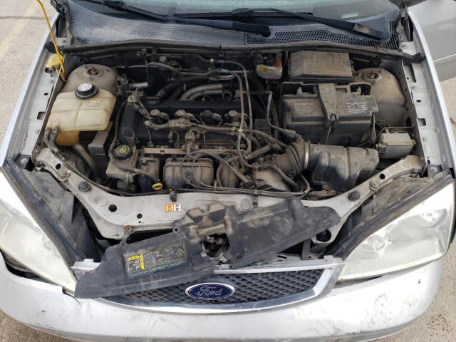 1FAFP34N47W306175 - 2007 FORD FOCUS ZX4 SILVER photo 11