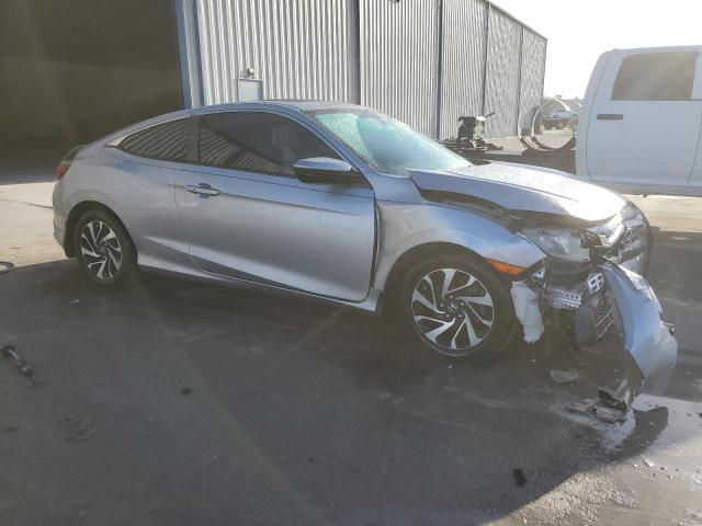 2HGFC4B04JH303027 - 2018 HONDA CIVIC LX SILVER photo 4