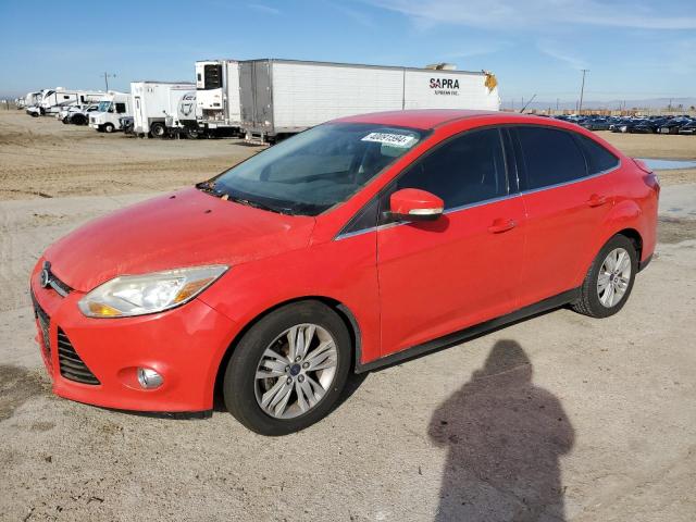 1FAHP3H22CL372518 - 2012 FORD FOCUS SEL RED photo 1