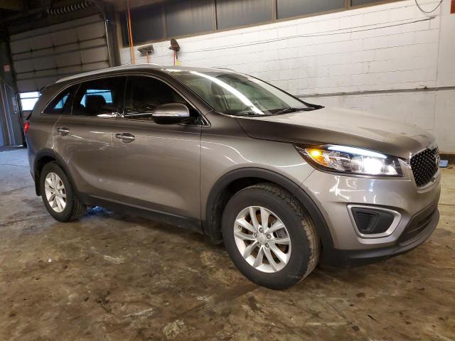 5XYPG4A31HG215709 - 2017 KIA SORENTO LX TAN photo 4