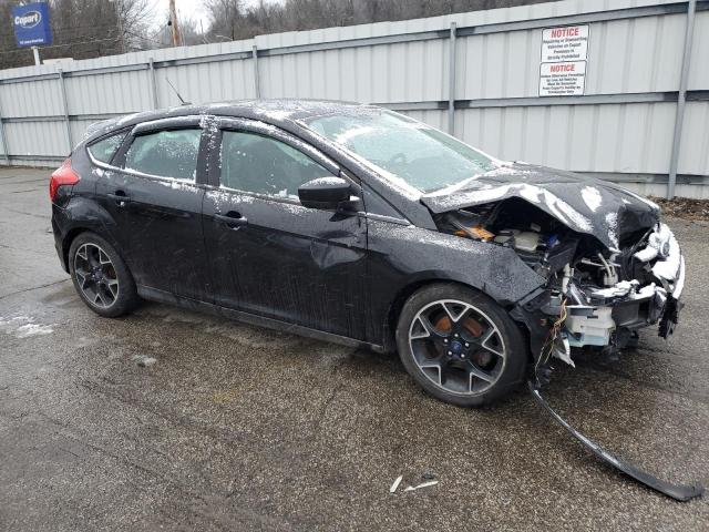 1FAHP3K28CL327981 - 2012 FORD FOCUS SE BLACK photo 4