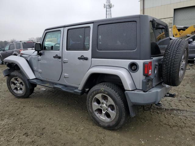 1C4BJWEG3GL125016 - 2016 JEEP WRANGLER U SAHARA SILVER photo 2